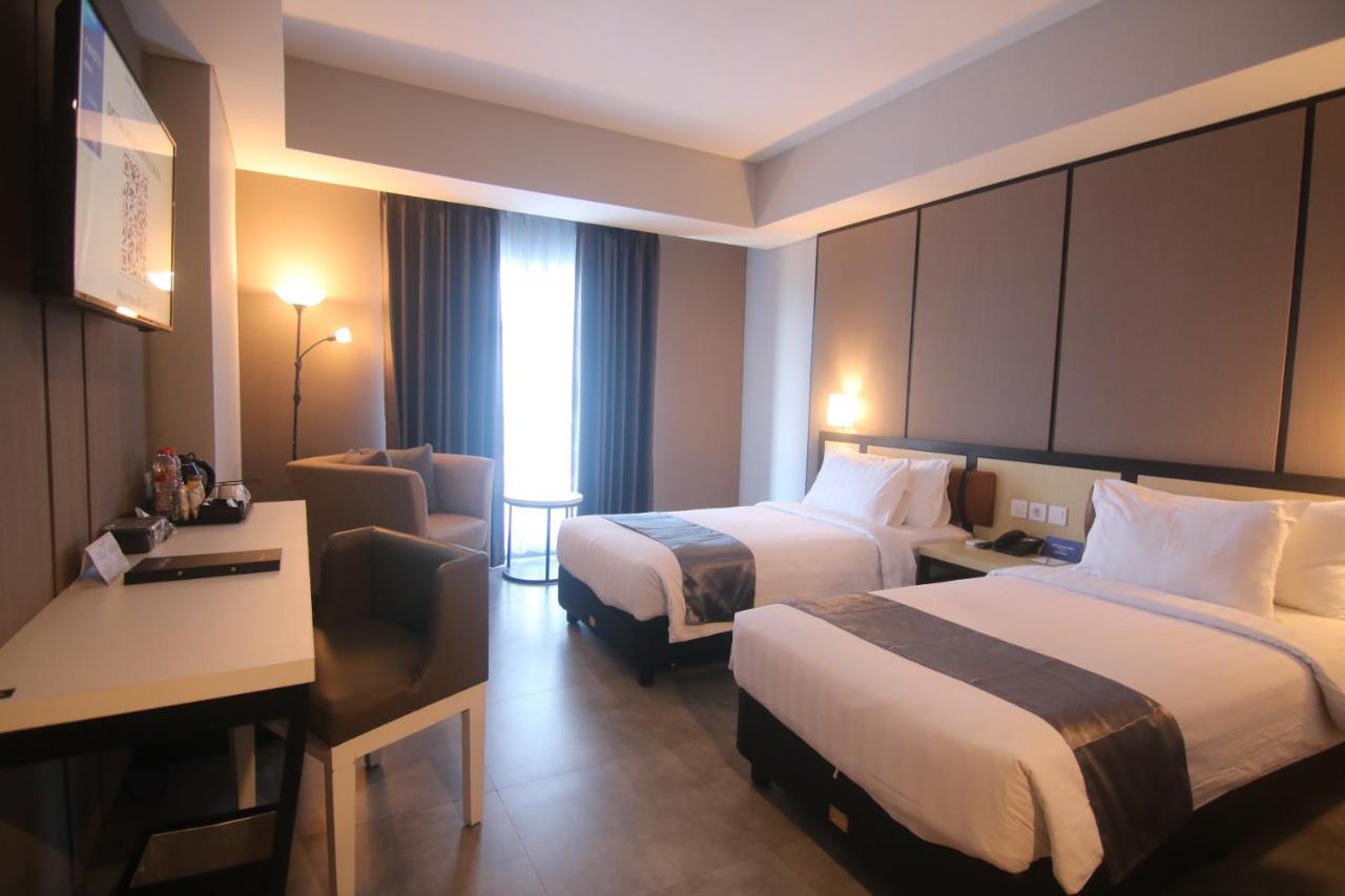 Bess Mansion Hotel Surabaya Wonotjolo Buitenkant foto